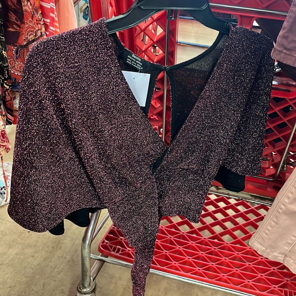 Burgundy crop top, open back with tide on the bottom
